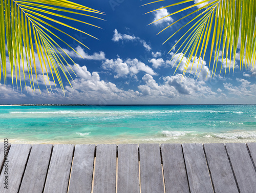 Fototapeta Naklejka Na Ścianę i Meble -  Wooden pier on caribbean beach