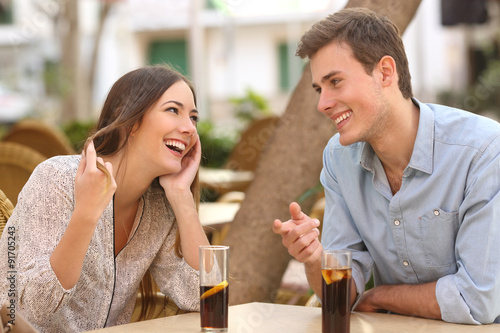 Couple dating and flirting in a restaurant