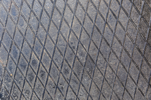 A metal plate on the floor