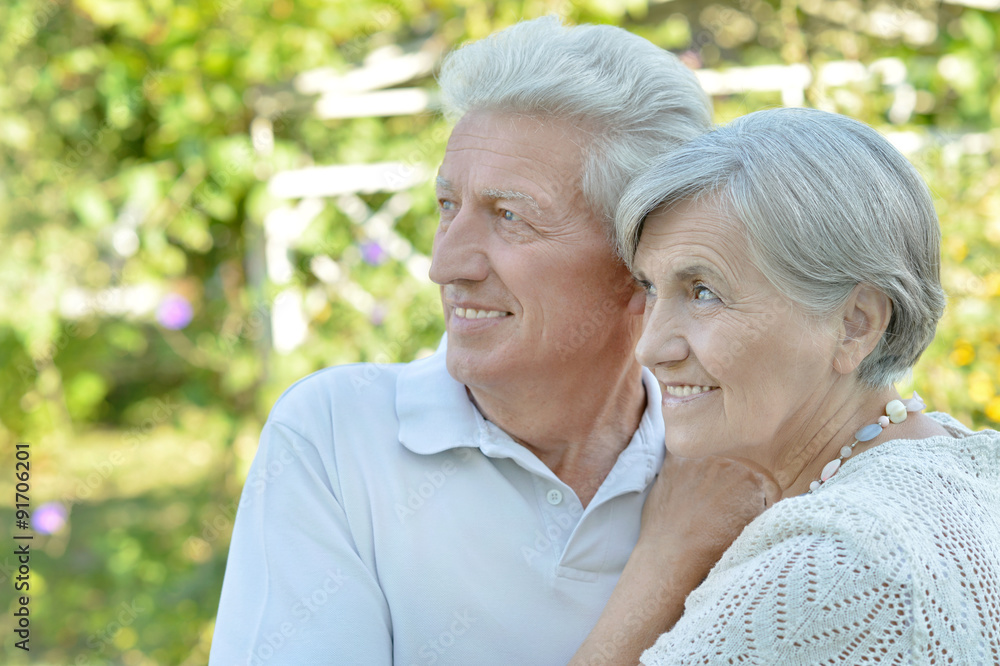 Mature couple on walk in summer Mature couple on walk in summer