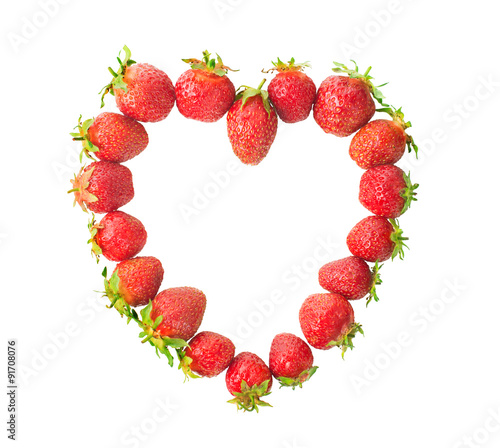 fresh strawberries laid out in the shape of heart isolated on photo