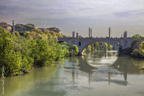 fiume tevere ponte flaminio roma photo