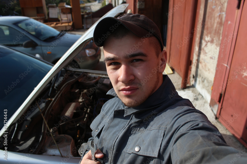 Auto mechanic with wrench in hand