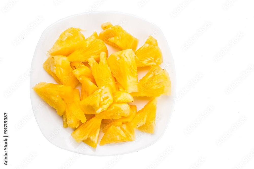 Freshly cut juicy, sweet nutritious pineapple fruit isolated in white Freshly cut juicy, sweet nutritious pineapple fruit isolated in white