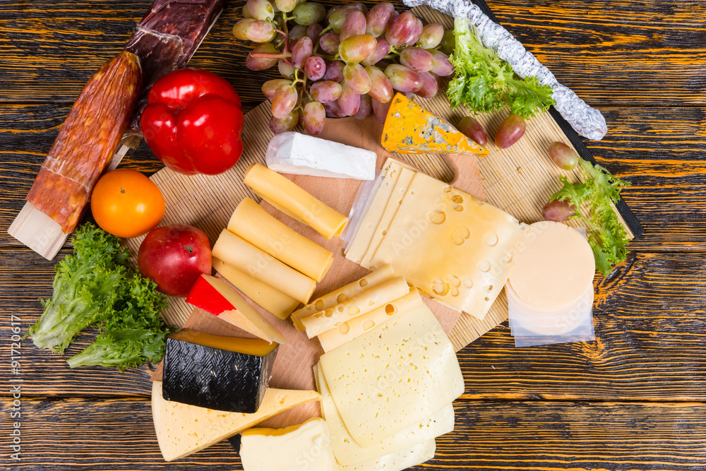 Colorful display of different cheeses on a buffet