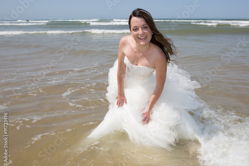 bride on beautiful Maldivian beach photo