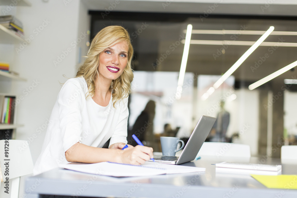 Young woman in the office Young woman in the office