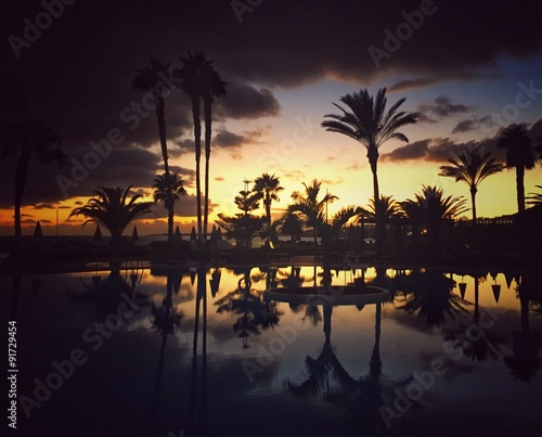 Beautiful sunset reflecting in the pool on holiday in Lanzarote 