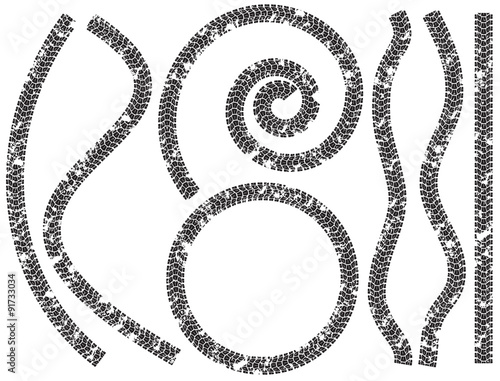 Collection of tire tracks in the mud for motorcycles
