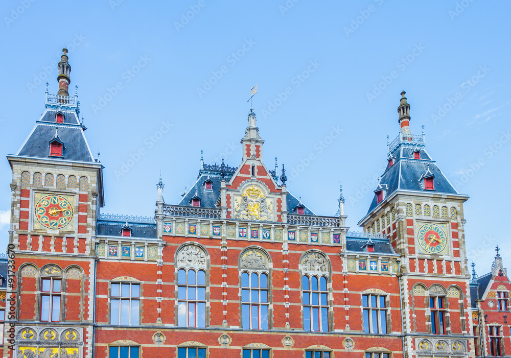 Traditional building of Amsterdam main train station in The Netherlands.