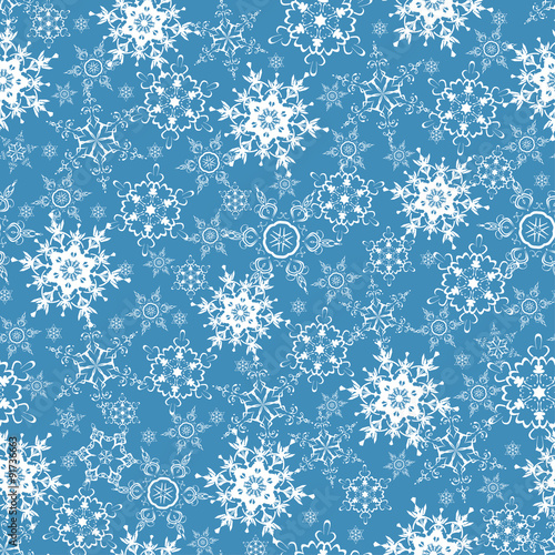 Festive seamless pattern with ornate snowflakes