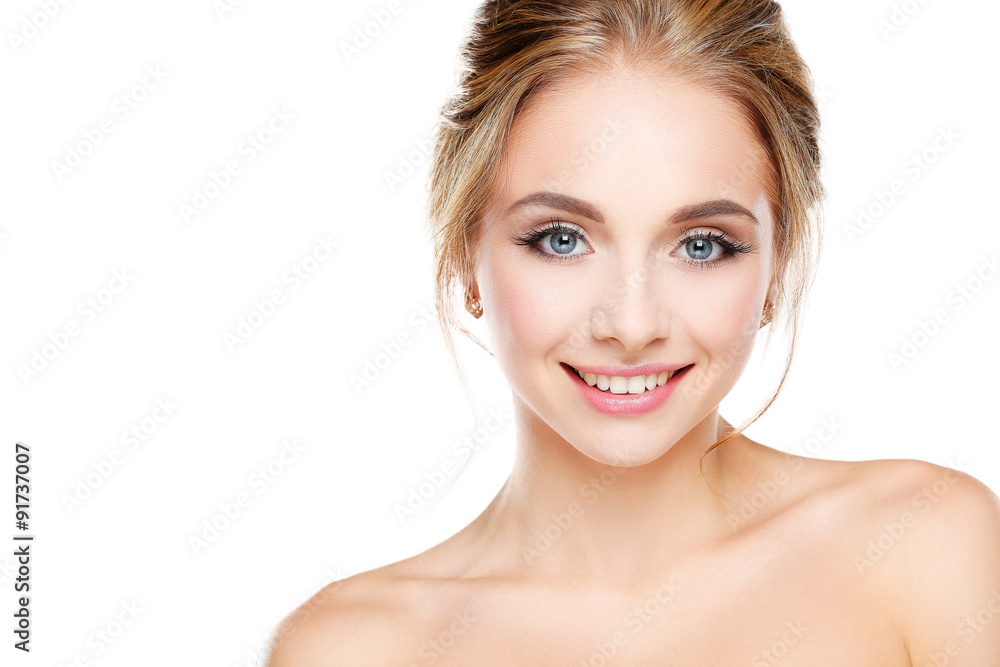 Studio shot of a beautiful young woman with perfect skin against Studio shot of a beautiful young woman with perfect skin against