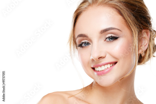 Studio shot of a beautiful young woman with perfect skin against