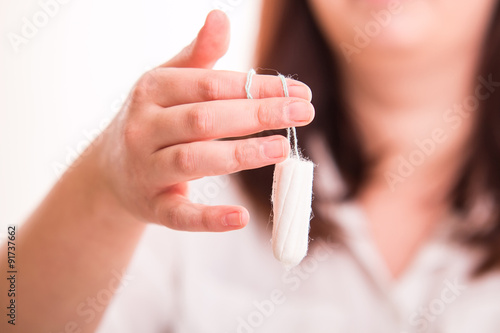 Close up on woman's tampon photo