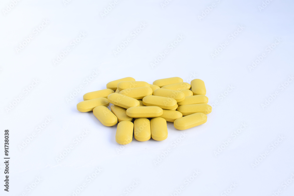Green pills on white background Green pills on white background