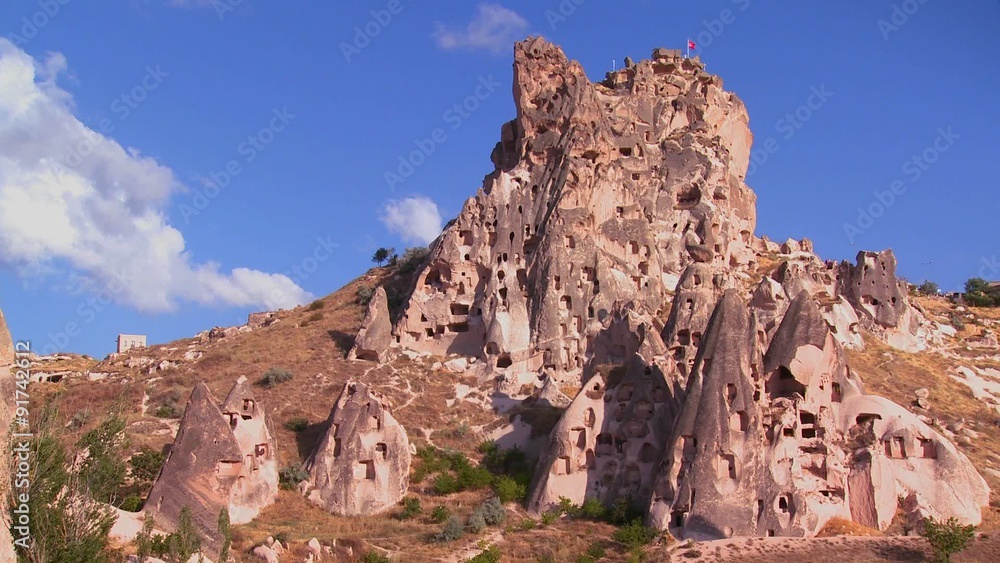 The strange towering dwellings and rock formations at Cappadocia, Turkey. The strange towering dwellings and rock formations at Cappadocia, Turkey.