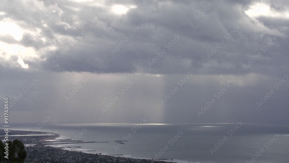 Pockets of light and shadow move across the ocean in this beautiful time lapse shot. Pockets of light and shadow move across the ocean in this beautiful time lapse shot.