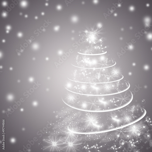 Silvery white winter holidays background or greeting card, with Christmas tree and falling snow. Black and white. Copyspace.