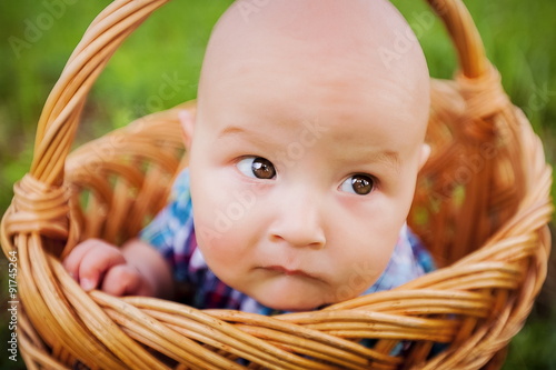 little boy in the basket - close-up