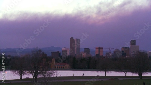 The skyline of Denver Colorado skyline at dusk in purple light. photo