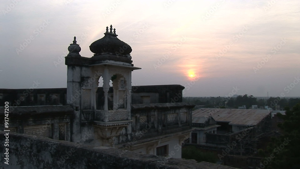 Ghanerao, India Castle Sunset over rooftops Ghanerao, India Castle Sunset over rooftops