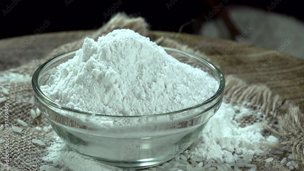 Rice Flour in a bowl (not loopable 4K UHD footage) Rice Flour in a bowl (not loopable 4K UHD footage)