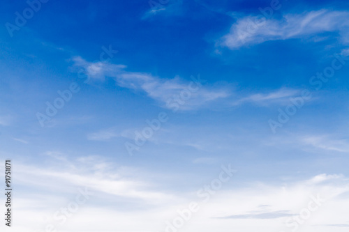 Blue sky background with white clouds.Blur or Defocus image.