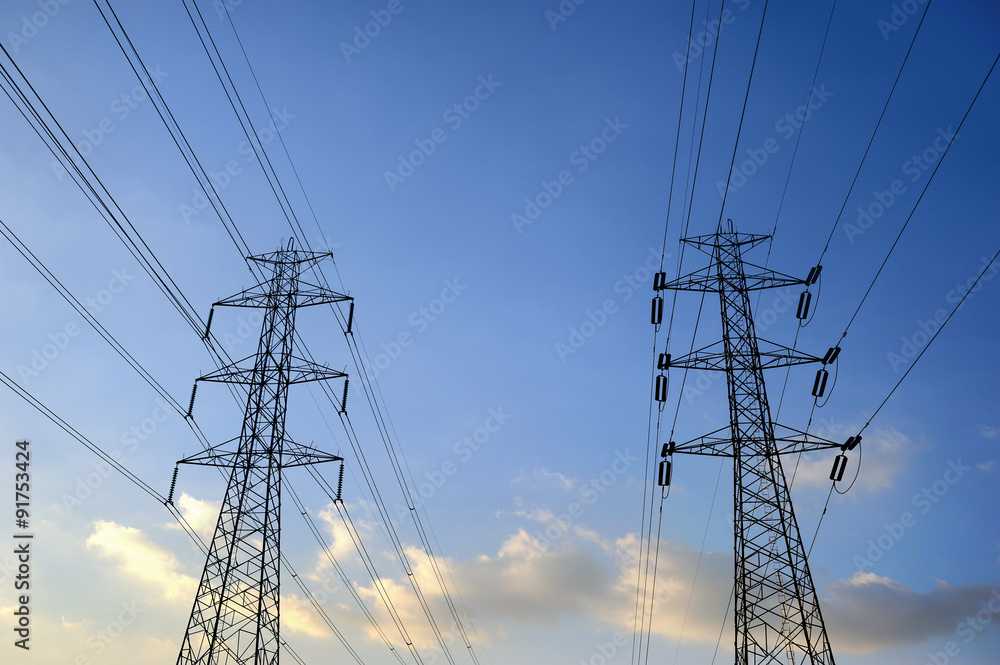 electricity pylons silhouetted electricity pylons silhouetted