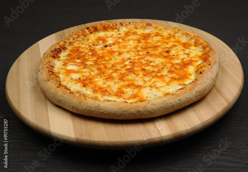 Traditional Italian cuisine - Pizza Quattro Formaggi

