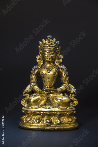 Bronze statue of Guanyin meditation © pixs4u