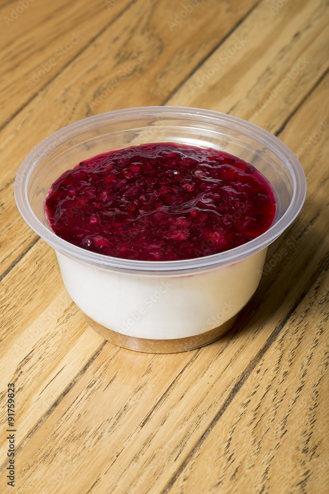 Raspberry cheese cake in plastic cup for take-out Raspberry cheese cake in plastic cup for take-out