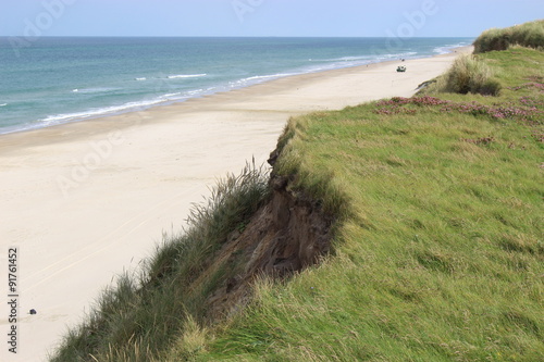 Dunes, beach and North Sea near Lokken, Denmark, Europe.