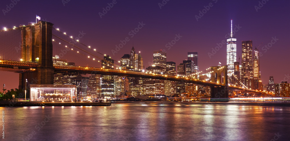 Brooklyn Bridge and Manhattan at night, New York City, USA.
