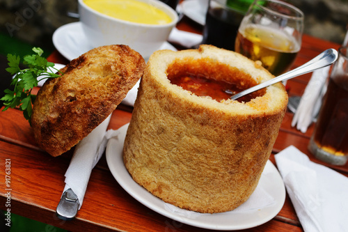 Traditional Romanian beans soup served in bread, from the Sighisoara region of Transylvania.