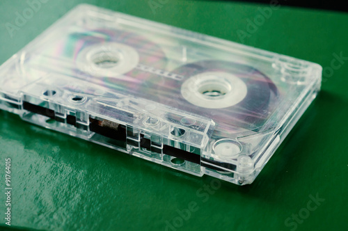 Wallpaper Mural Old audio cassette on a green background close up Torontodigital.ca