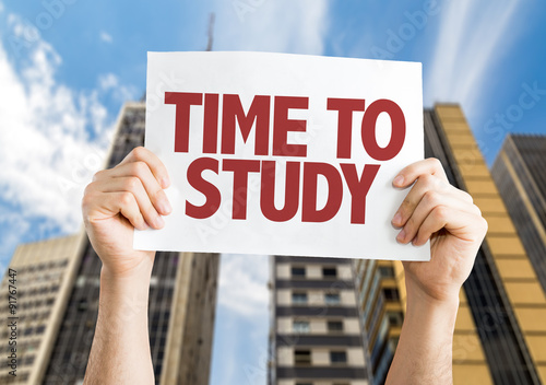Wallpaper Mural Time To Study placard with skyscrappers background Torontodigital.ca