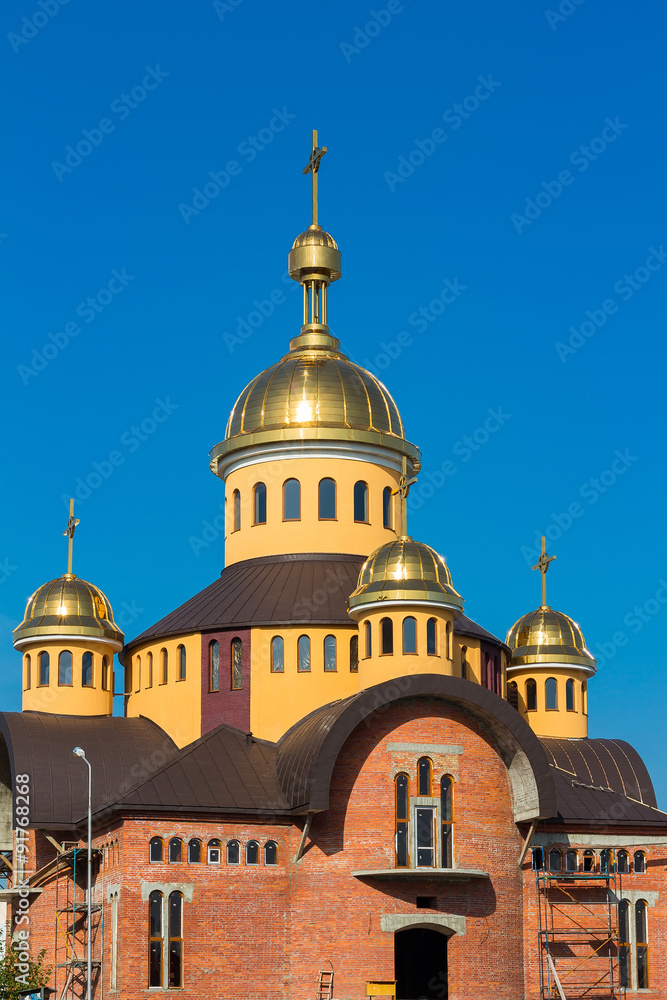 Unfinished orthodox church in blue background, Lviv