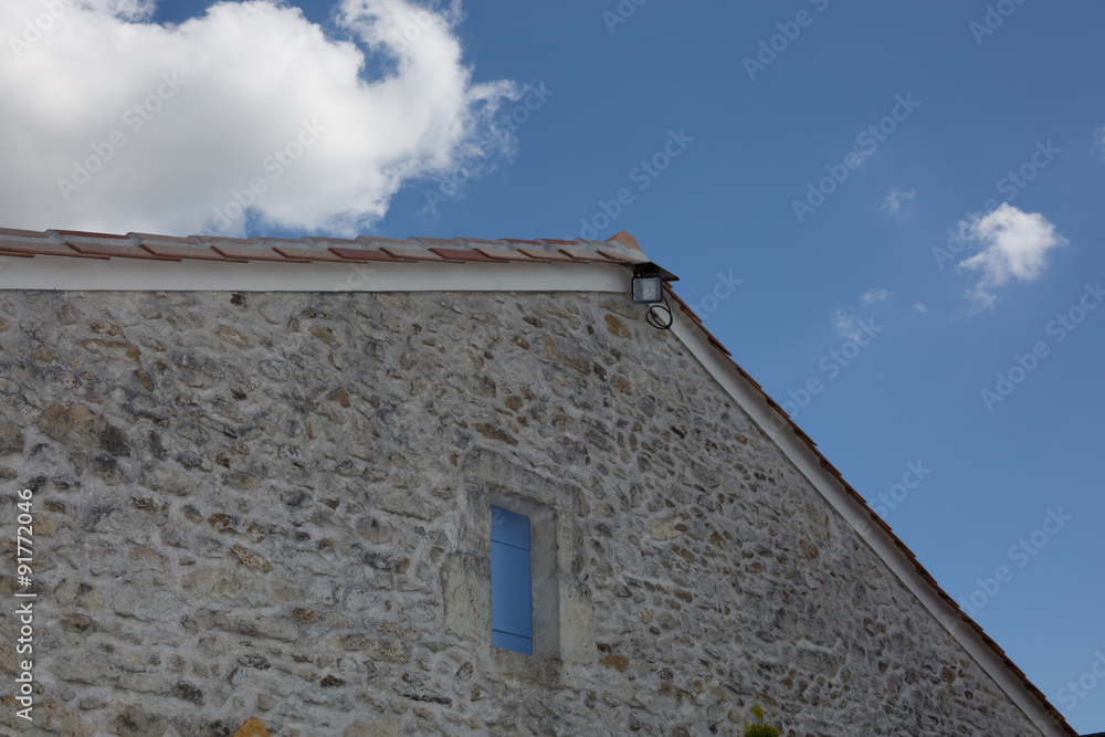 Roof of a house under blue sky