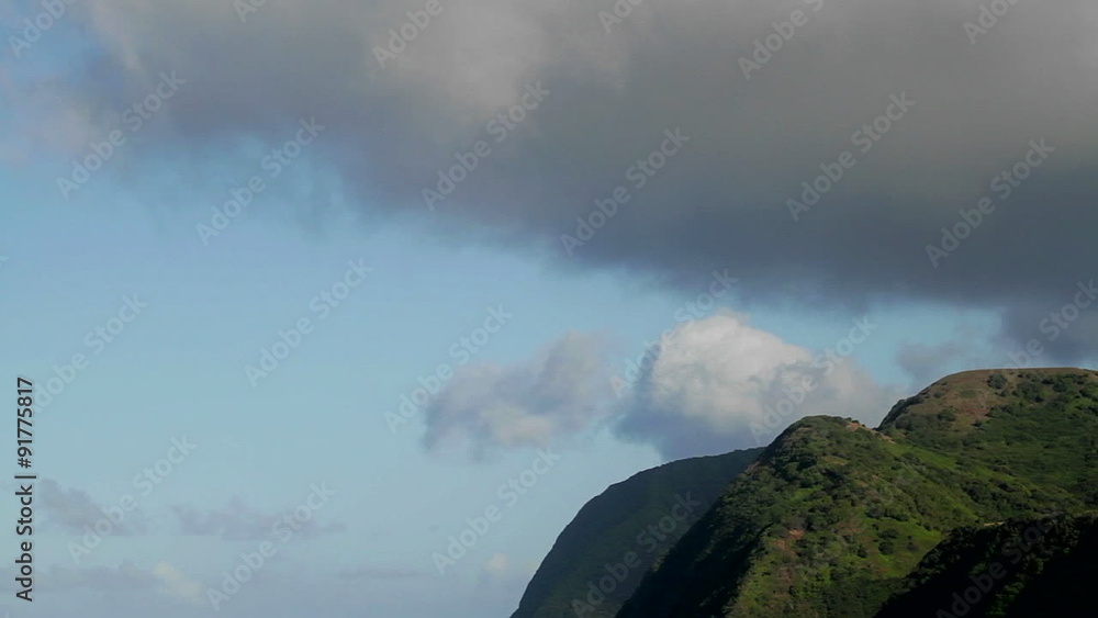 Time lapse of clouds over a mountaintop on a tropical island. Time lapse of clouds over a mountaintop on a tropical island.