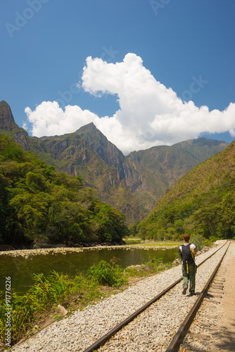 Walking on railway track to Machu Picchu, Peru