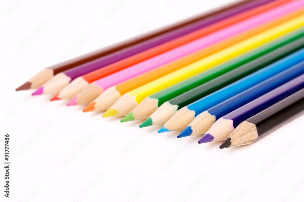 Colorful wooden pencils isolated on white background