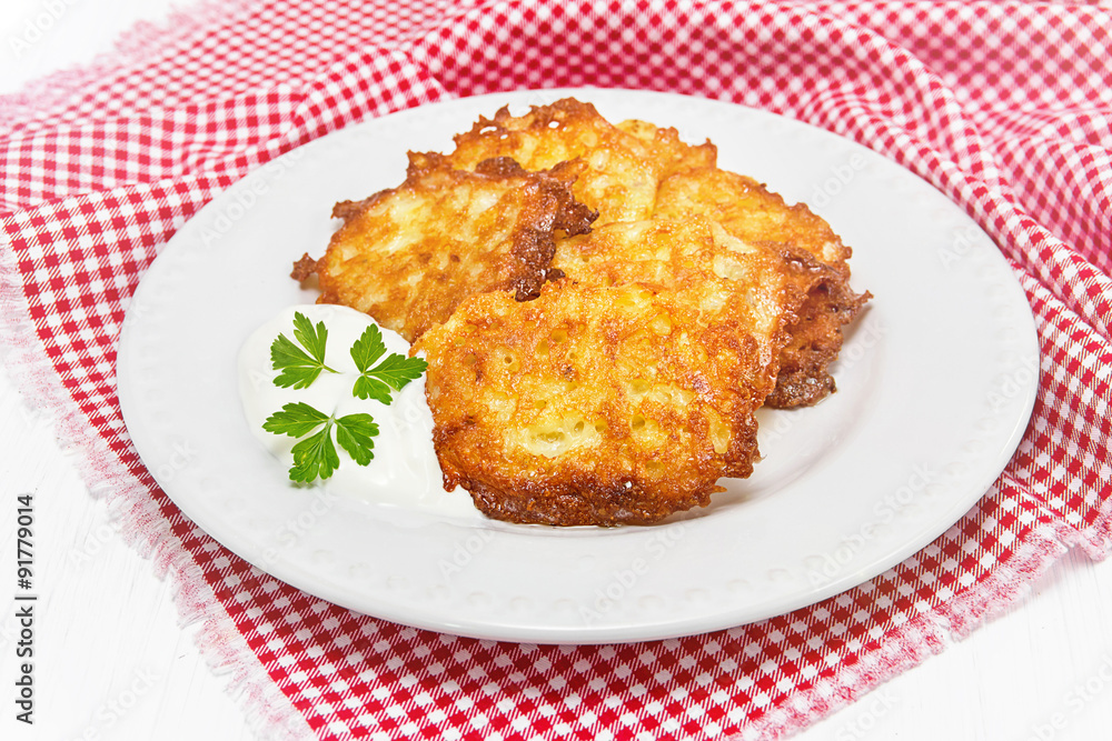 Potato pancakes with sour cream Potato pancakes with sour cream