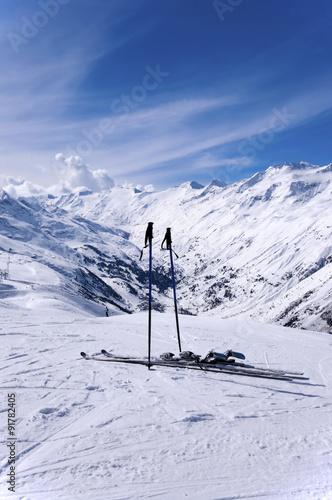 Skis and ski sticks in Alps, Austria