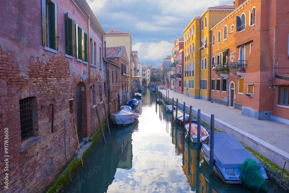 Street in Venice with small channel