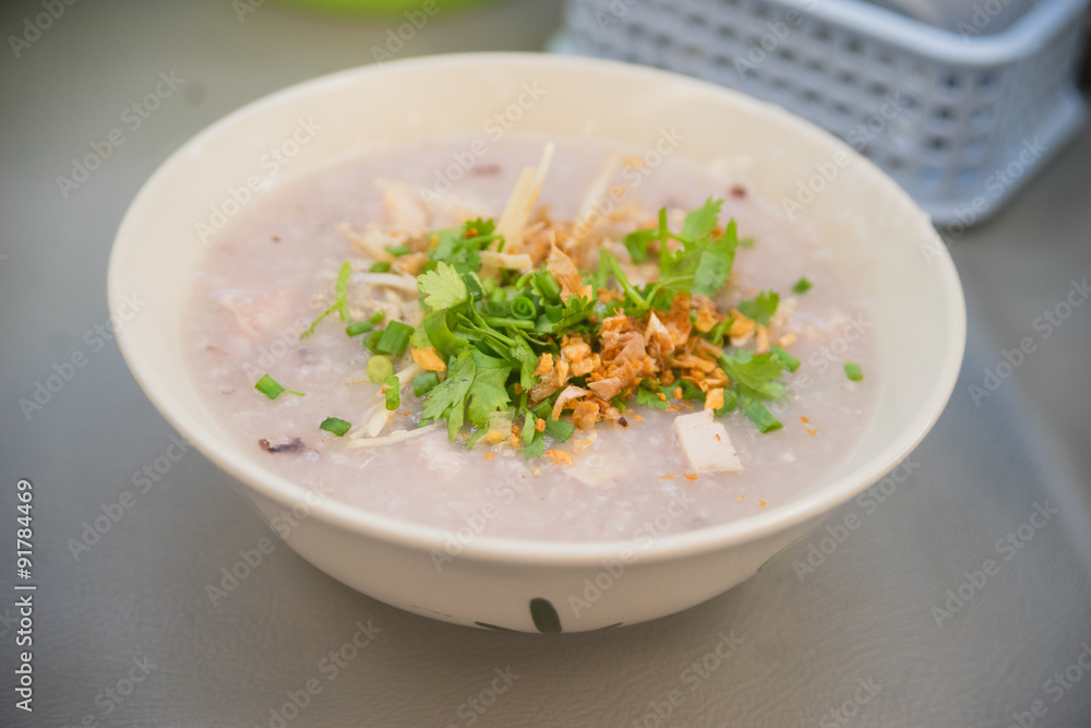 Soft boiled rice with pork and vegetable in breakfast time Soft boiled rice with pork and vegetable in breakfast time