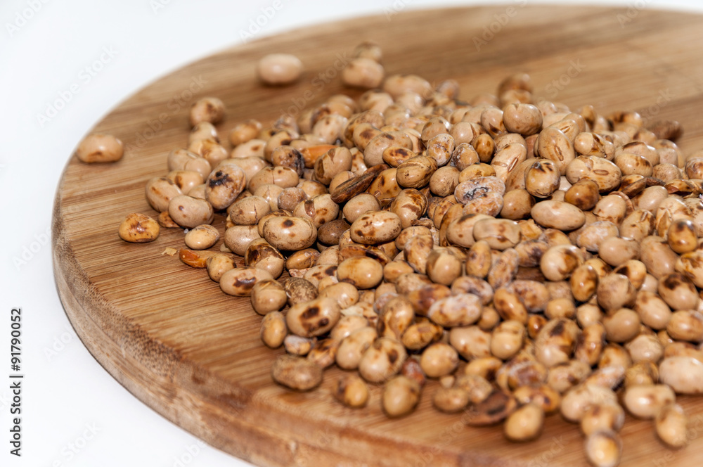 Soy beans on the wooden board Soy beans on the wooden board