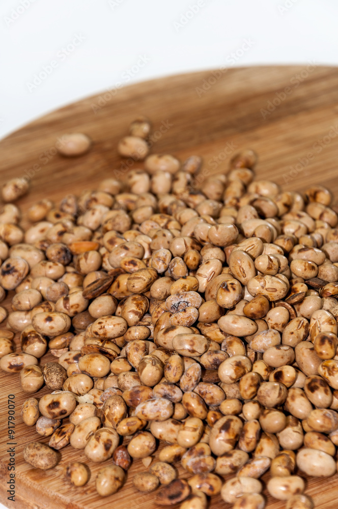 Soy beans on the wooden board Soy beans on the wooden board
