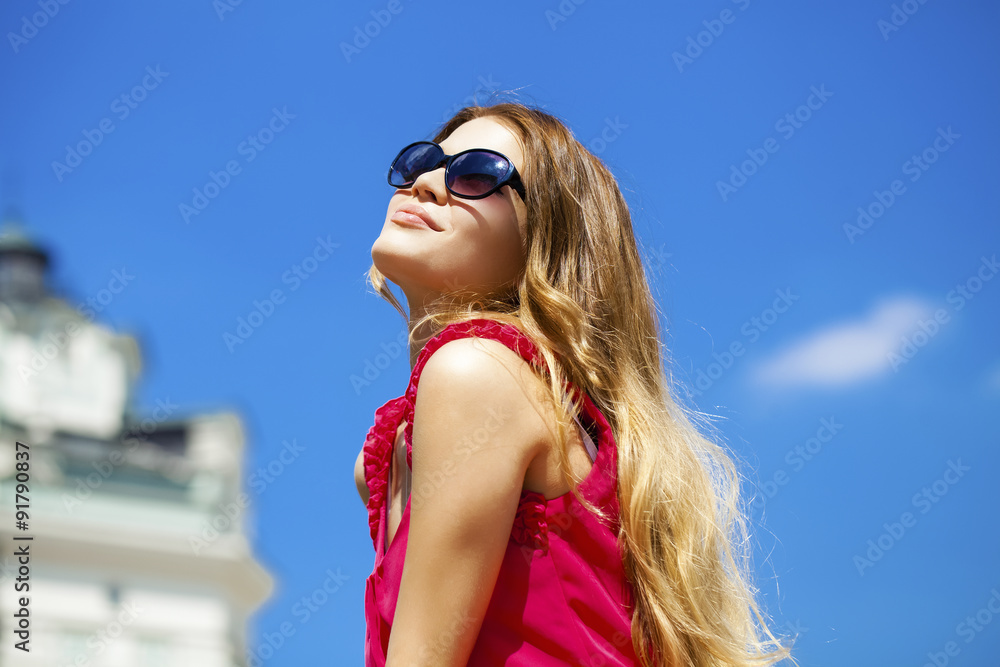 Charming happy blonde girl in sunglasses Charming happy blonde girl in sunglasses