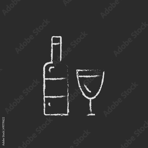 Bottle and a glass icon drawn in chalk.