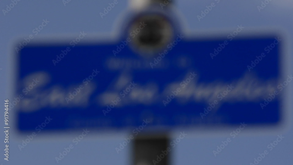 Rack focus on a Welcome to East Los Angeles sign at Belvedere Community Regional Park in East Los Angeles, California. Rack focus on a Welcome to East Los Angeles sign at Belvedere Community Regional Park in East Los Angeles, California.